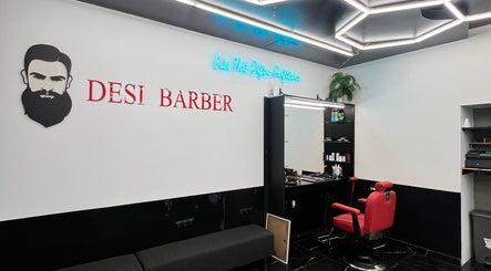 Modern barber station at Desi (Aleksandra Caka) in Rīga, LV with bold decor and vibrant red chair.