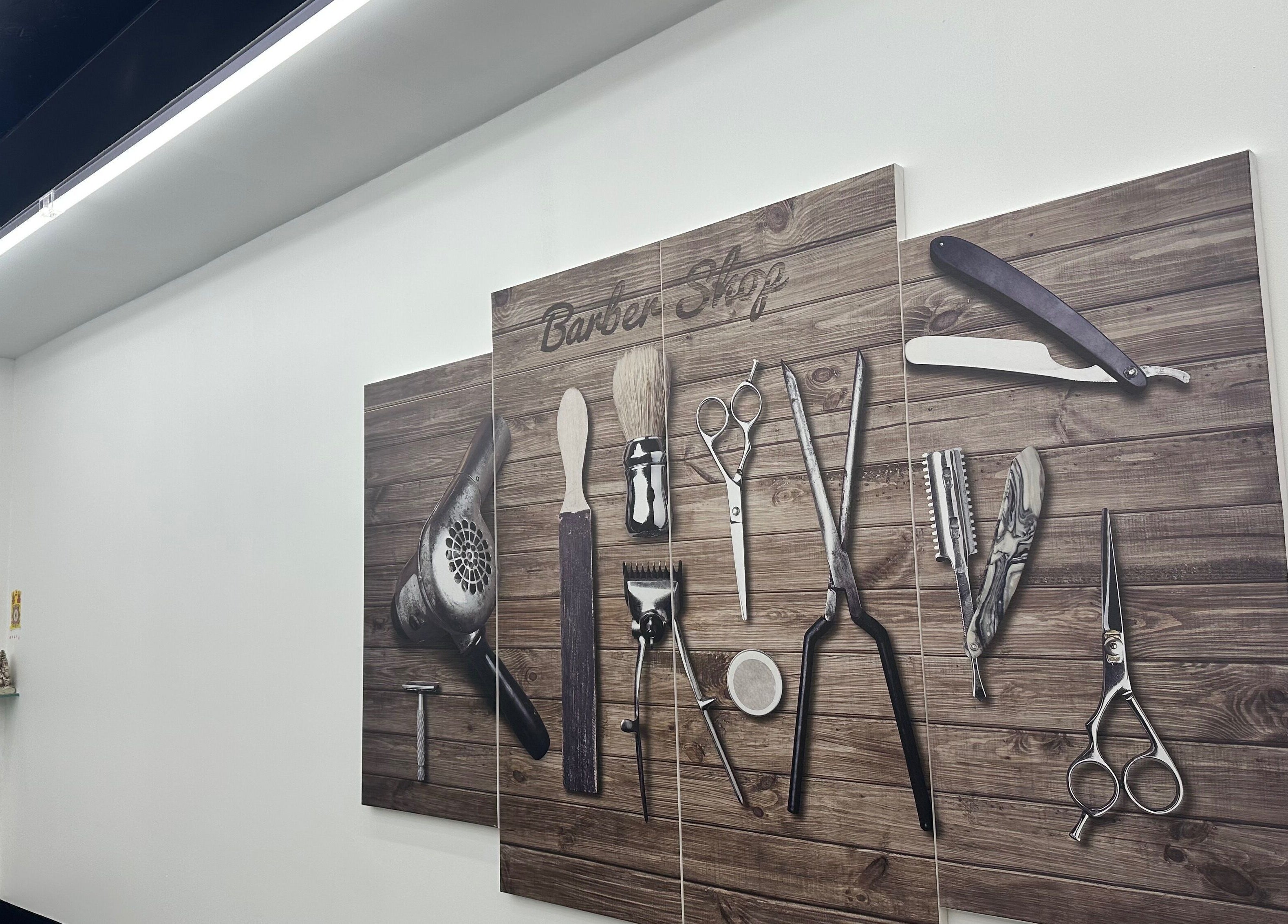 Barber shop decor featuring vintage tools at Desi (Brivibas Iela), Rīga, LV. Modern and stylish interior.