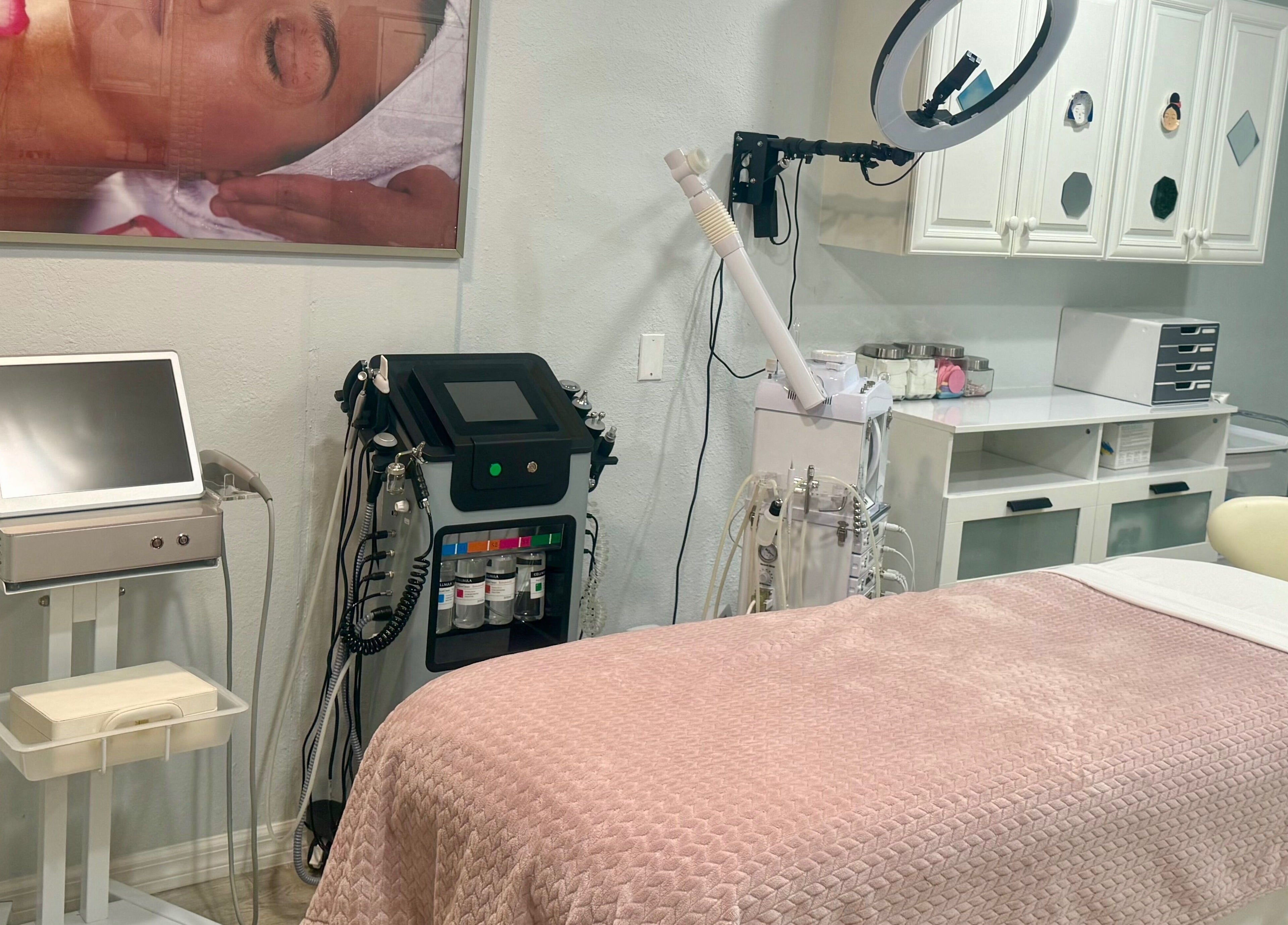 Modern treatment room at Inalvis Oasis Spa, Fort Myers, Florida, US with facial equipment and a relaxing vibe.
