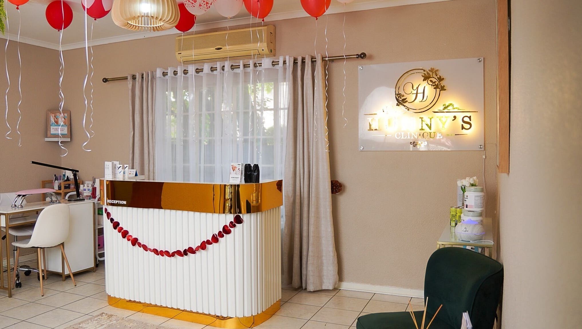 Stylish reception area at Hunny's Clinique, Rustenburg, North West, ZA with elegant decor and welcoming ambiance.