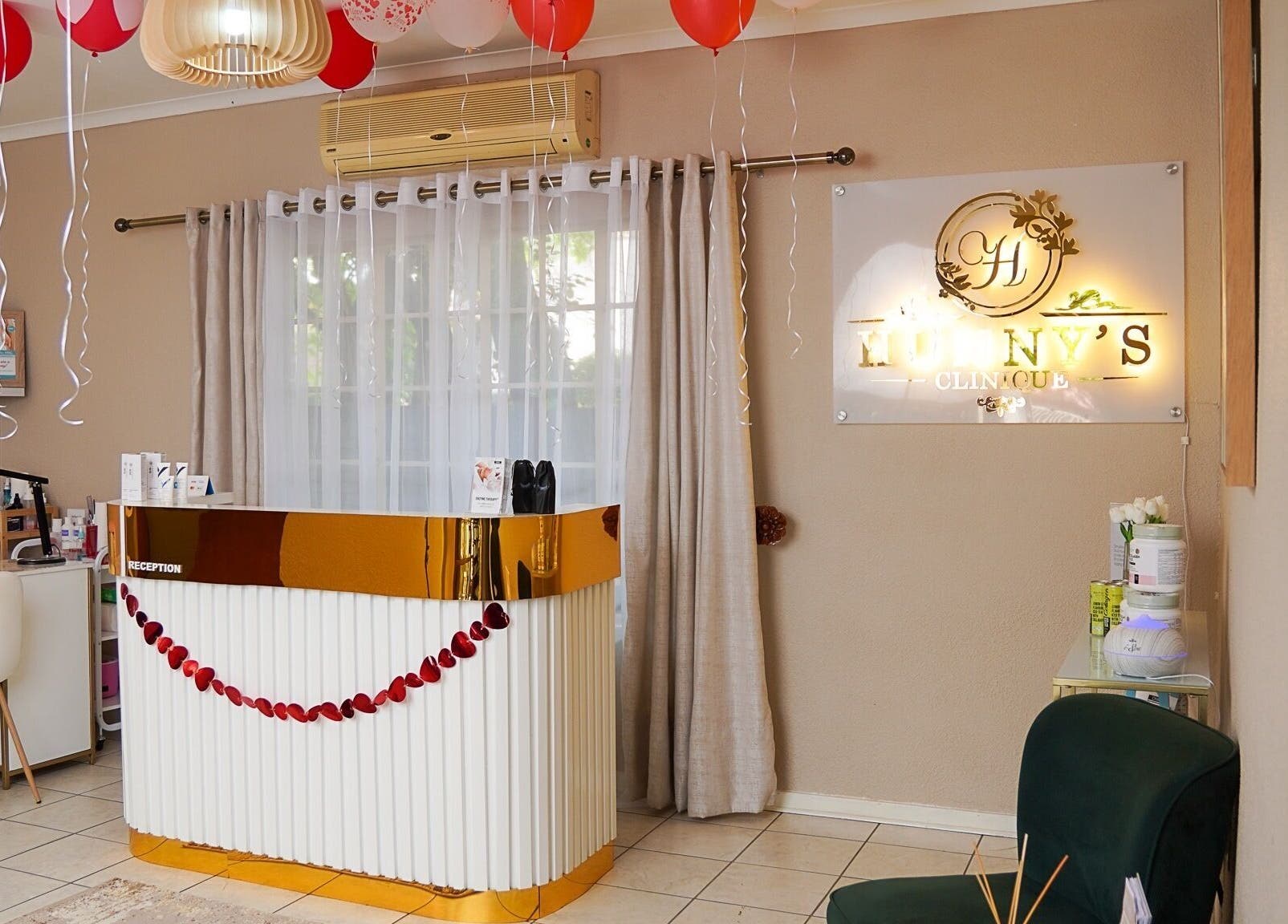 Stylish reception area at Hunny's Clinique, Rustenburg, North West, ZA with elegant decor and welcoming ambiance.