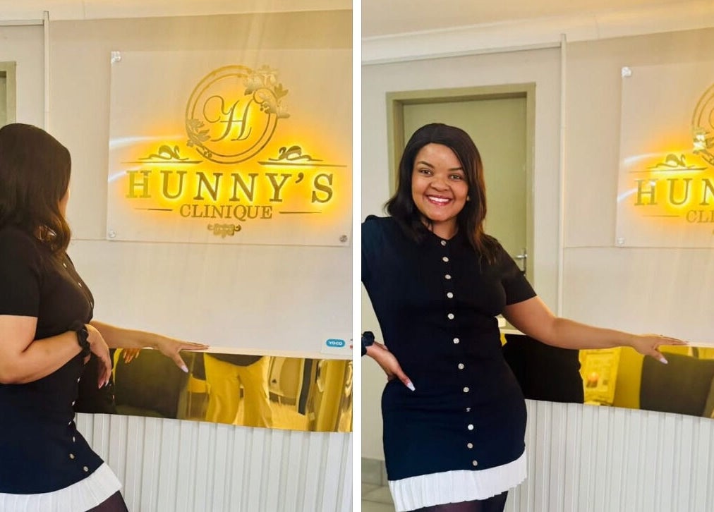 Woman at Hunny's Clinique reception in Rustenburg, North West, ZA, showcasing modern elegance and style.