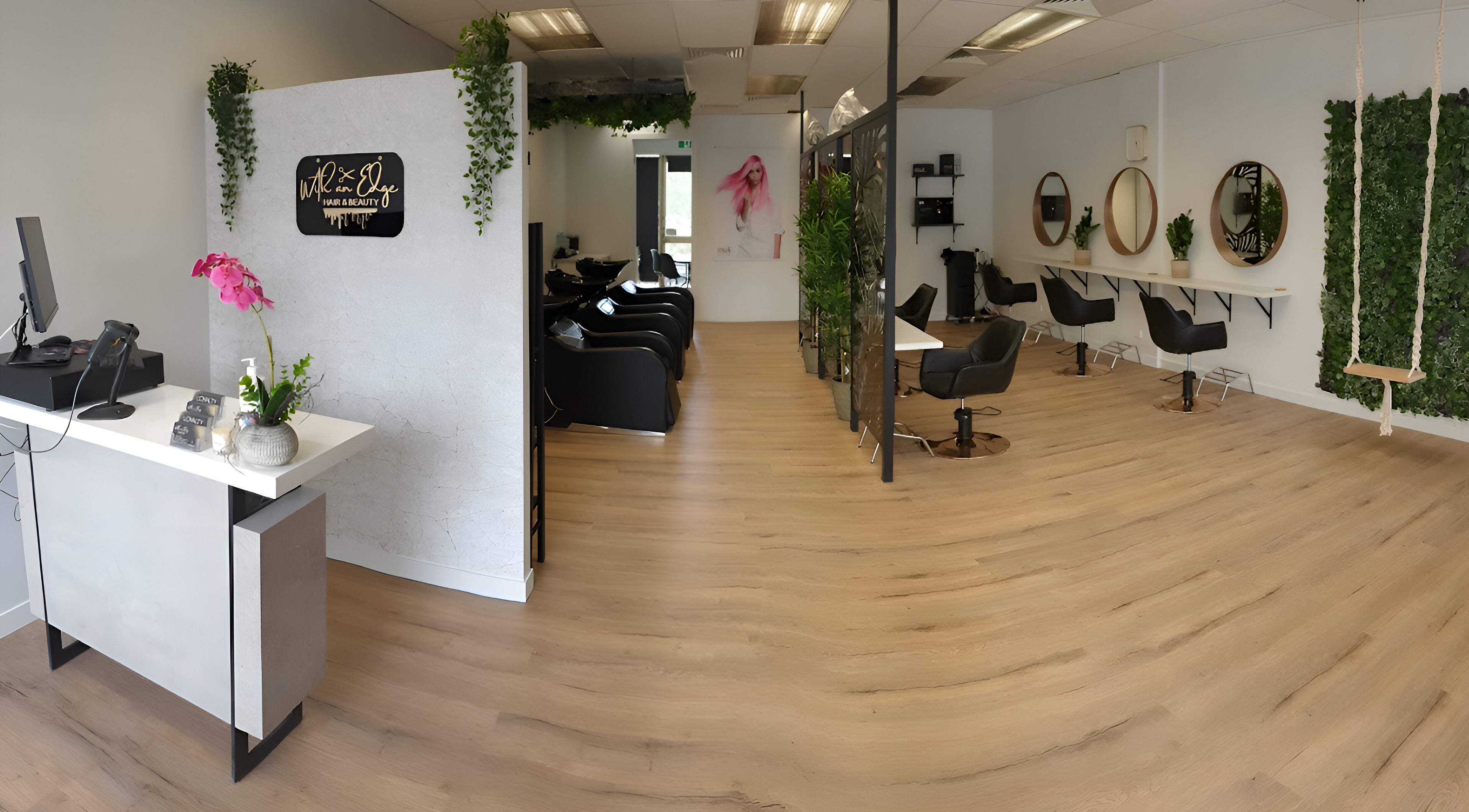 Spacious interior of With an Edge Hair, Beauty and Head Spa Ormeau in Ormeau, Queensland, AU featuring elegant decor.
