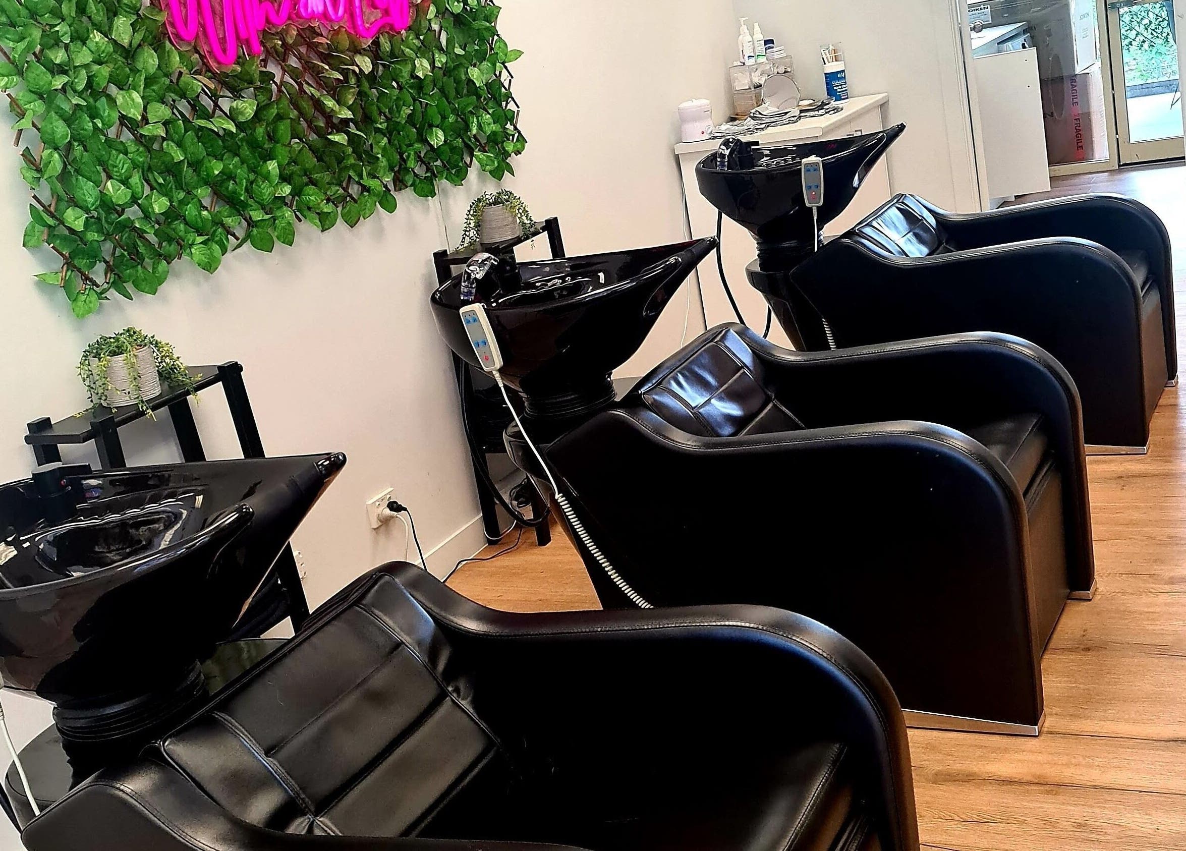 Stylish wash stations at With an Edge Hair, Beauty and Head Spa Ormeau in Ormeau, Queensland, AU.
