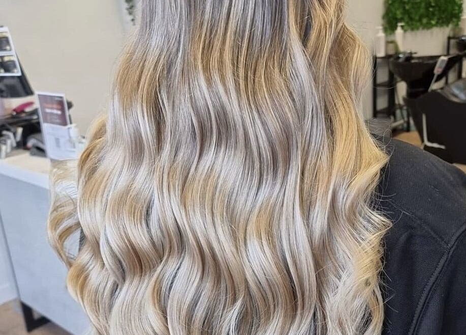 Elegant blonde waves at With an Edge Hair, Beauty and Head Spa Ormeau, Ormeau, Queensland, AU.