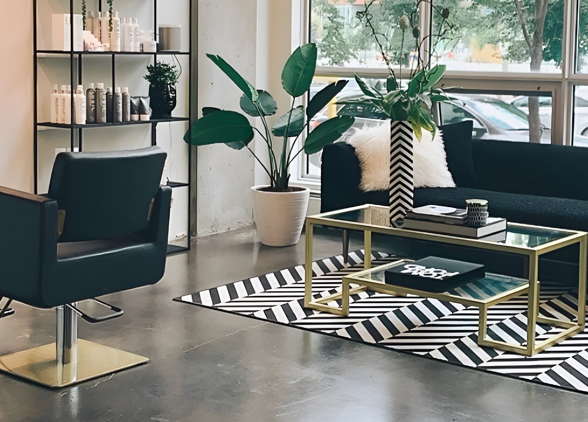 Elegant salon interior at Crimson & Clovis, Calgary, Alberta, CA, with chic decor and seating.