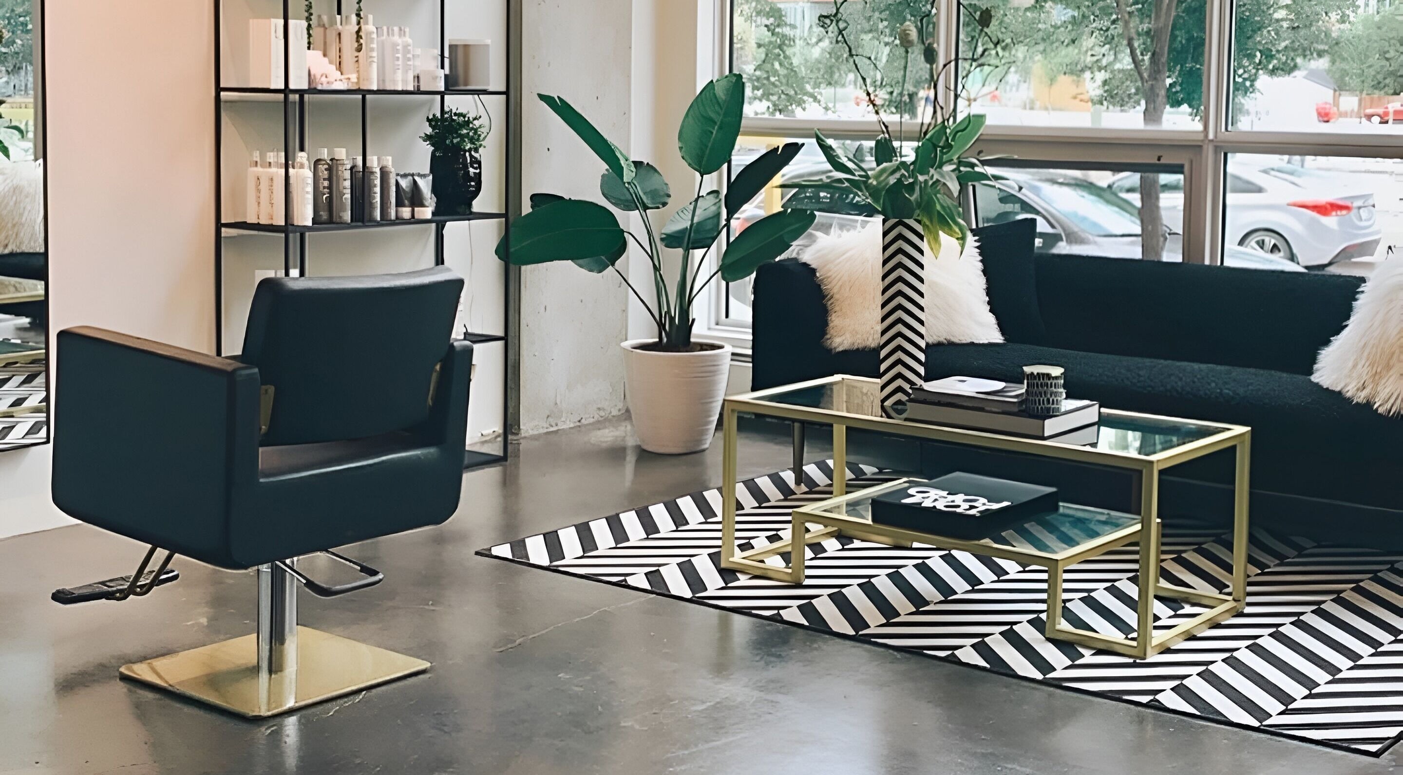 Elegant salon interior at Crimson & Clovis, Calgary, Alberta, CA, with chic decor and seating.