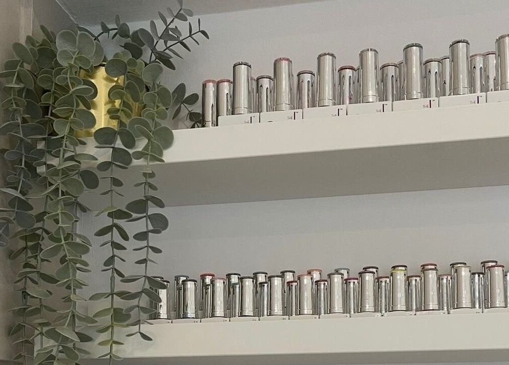Shelf with silver containers and greenery at Nails by Alexandrea, Bonnyrigg, Scotland, GB.
