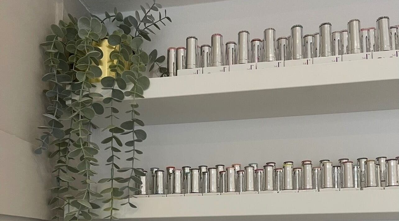 Shelf with silver containers and greenery at Nails by Alexandrea, Bonnyrigg, Scotland, GB.