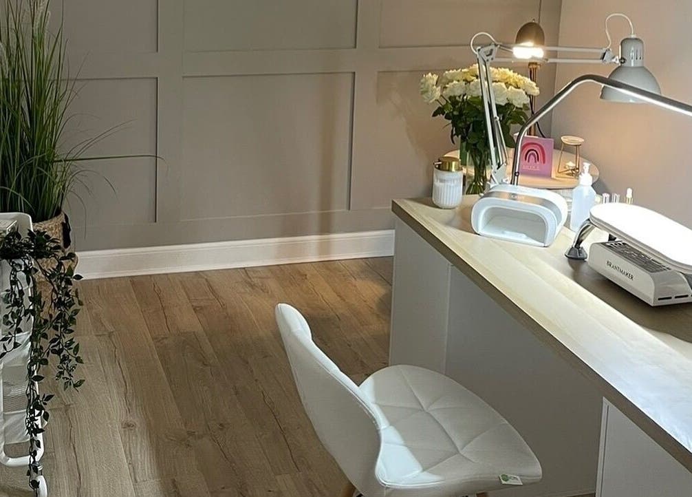 Elegant manicure station at Nails by Alexandrea, Bonnyrigg, Scotland, GB with stylish decor and sleek furniture.