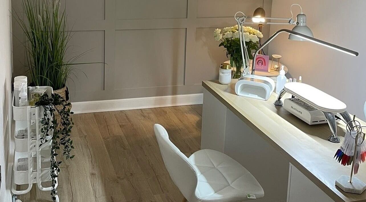 Elegant manicure station at Nails by Alexandrea, Bonnyrigg, Scotland, GB with stylish decor and sleek furniture.