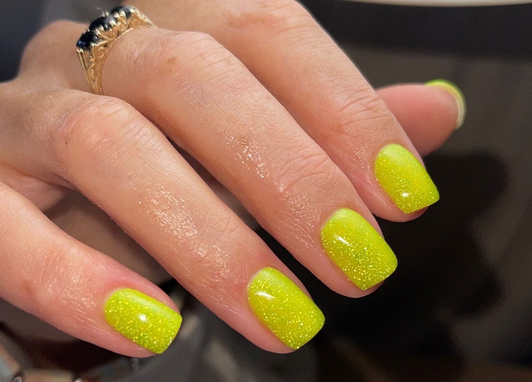 Vibrant lime green nails at Nails by Alexandrea, Bonnyrigg, Scotland, GB, showcasing a glossy finish.
