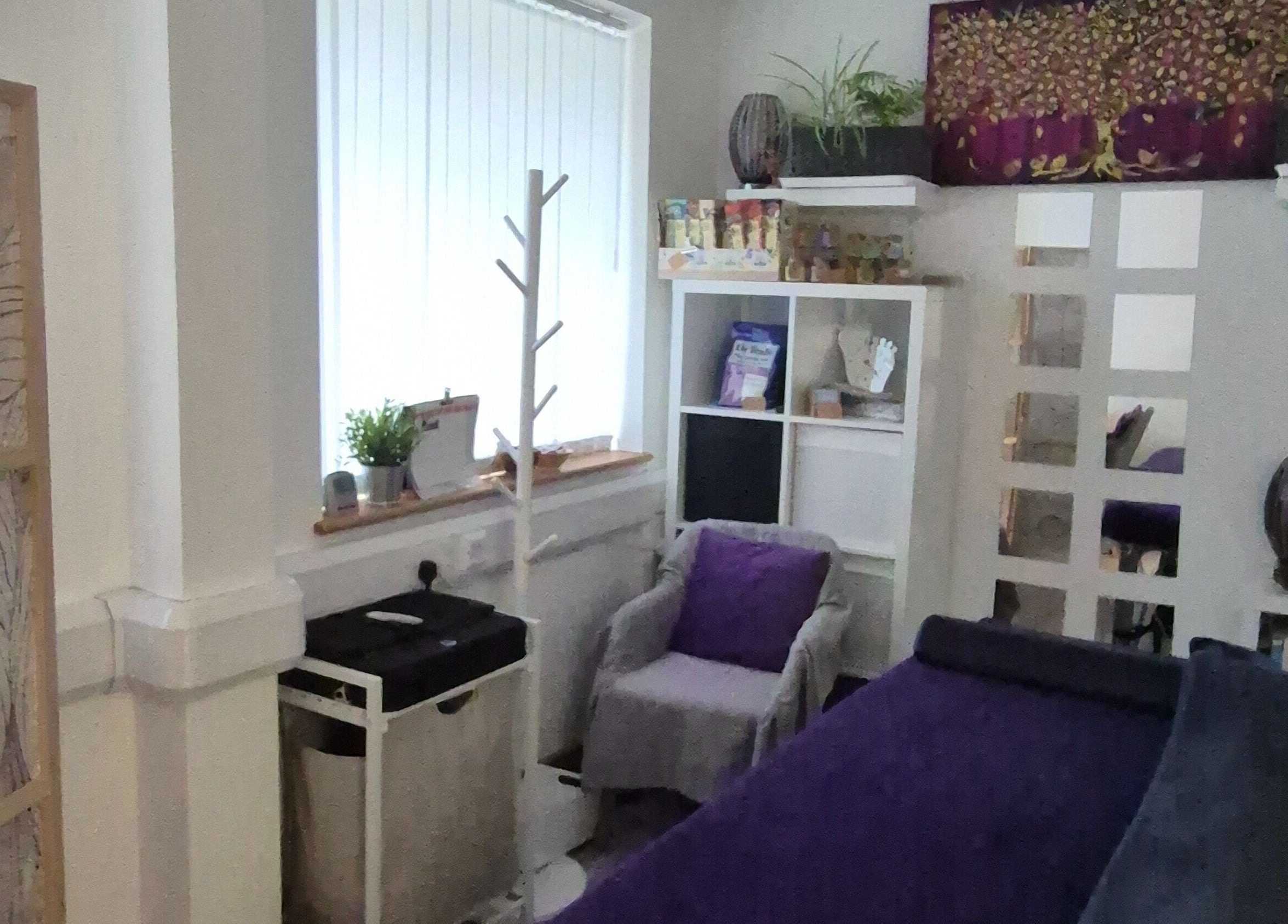 Tranquil therapy room at Louise Morgan Holistic Therapist, Bristol, England, GB, featuring calming decor.