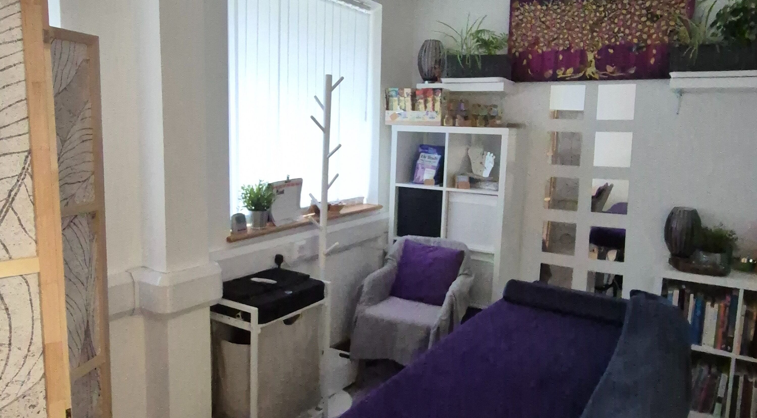 Tranquil therapy room at Louise Morgan Holistic Therapist, Bristol, England, GB, featuring calming decor.