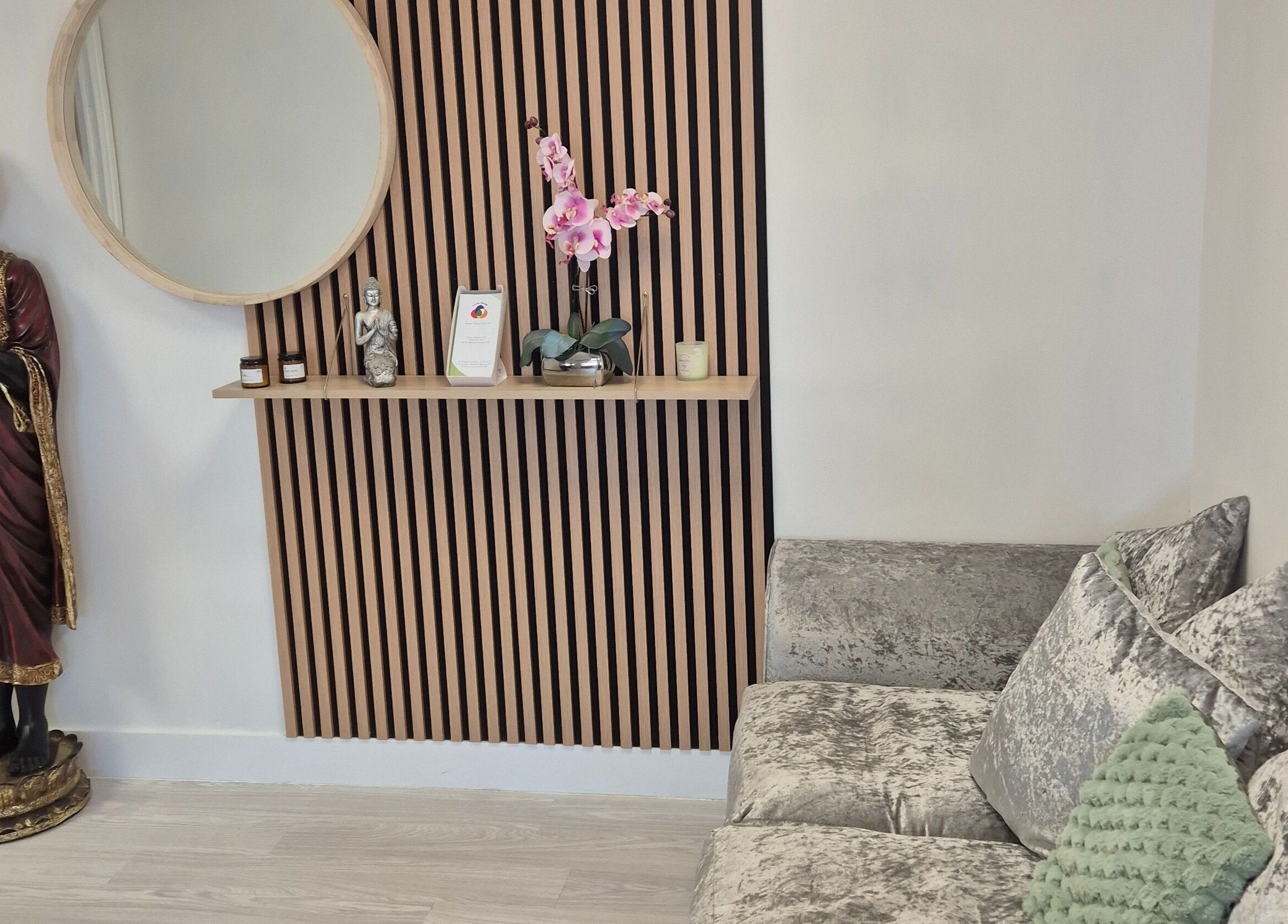 Louise Morgan Holistic Therapist's Bristol venue features a serene seating area with decor accents.