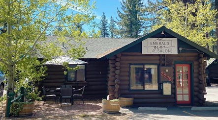 Emerald Grove Salon nestled among trees in South Lake Tahoe, California, US, offering a rustic beauty retreat.