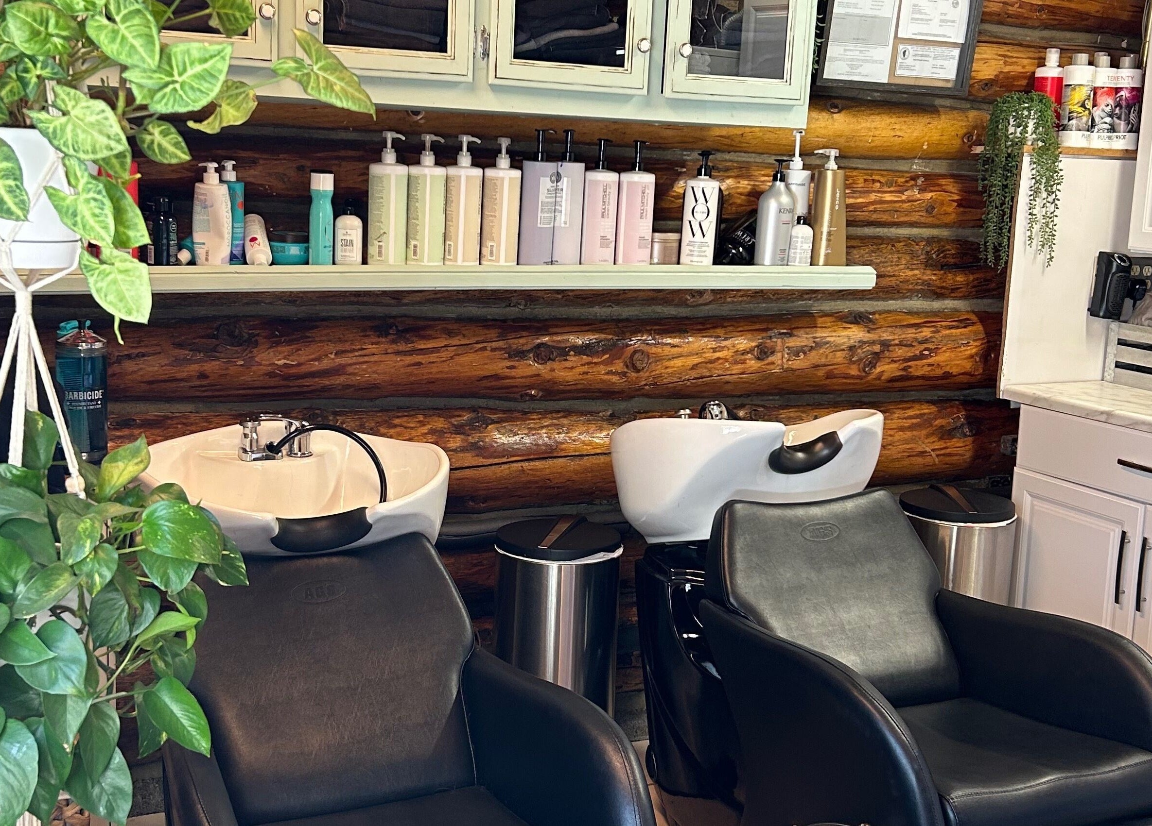 Cozy wash station with wooden accents at Emerald Grove Salon, South Lake Tahoe, California, US.