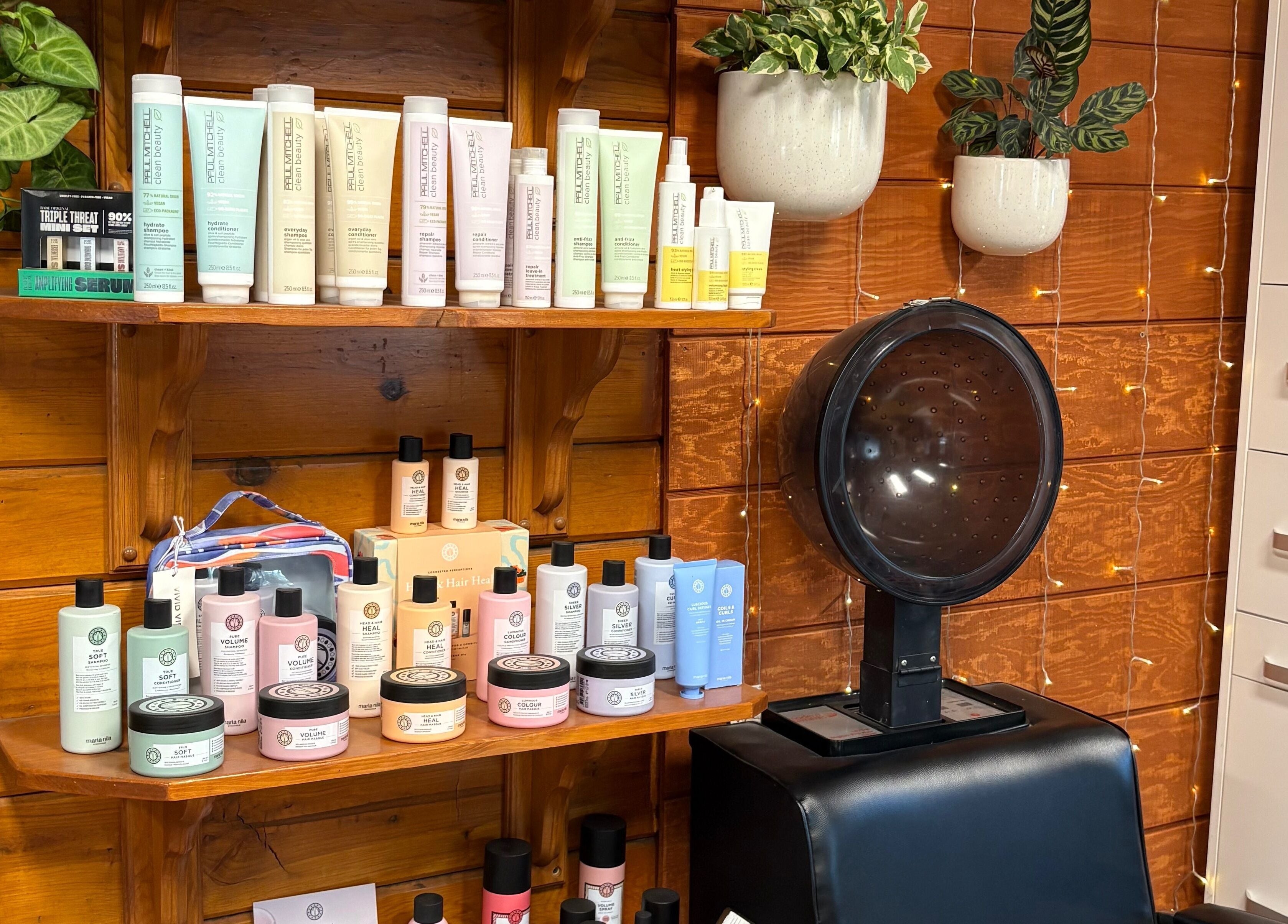 Emerald Grove Salon hair products shelf at South Lake Tahoe, California, US with relaxing ambiance.