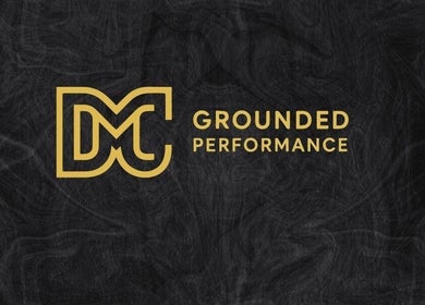 Grounded Performance logo with gold lettering on dark background in Livingston, Scotland, GB.