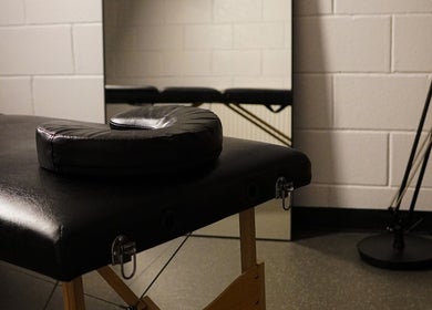 Massage table in tranquil room at Grounded Performance, Livingston, Scotland, GB, ideal for wellness sessions.