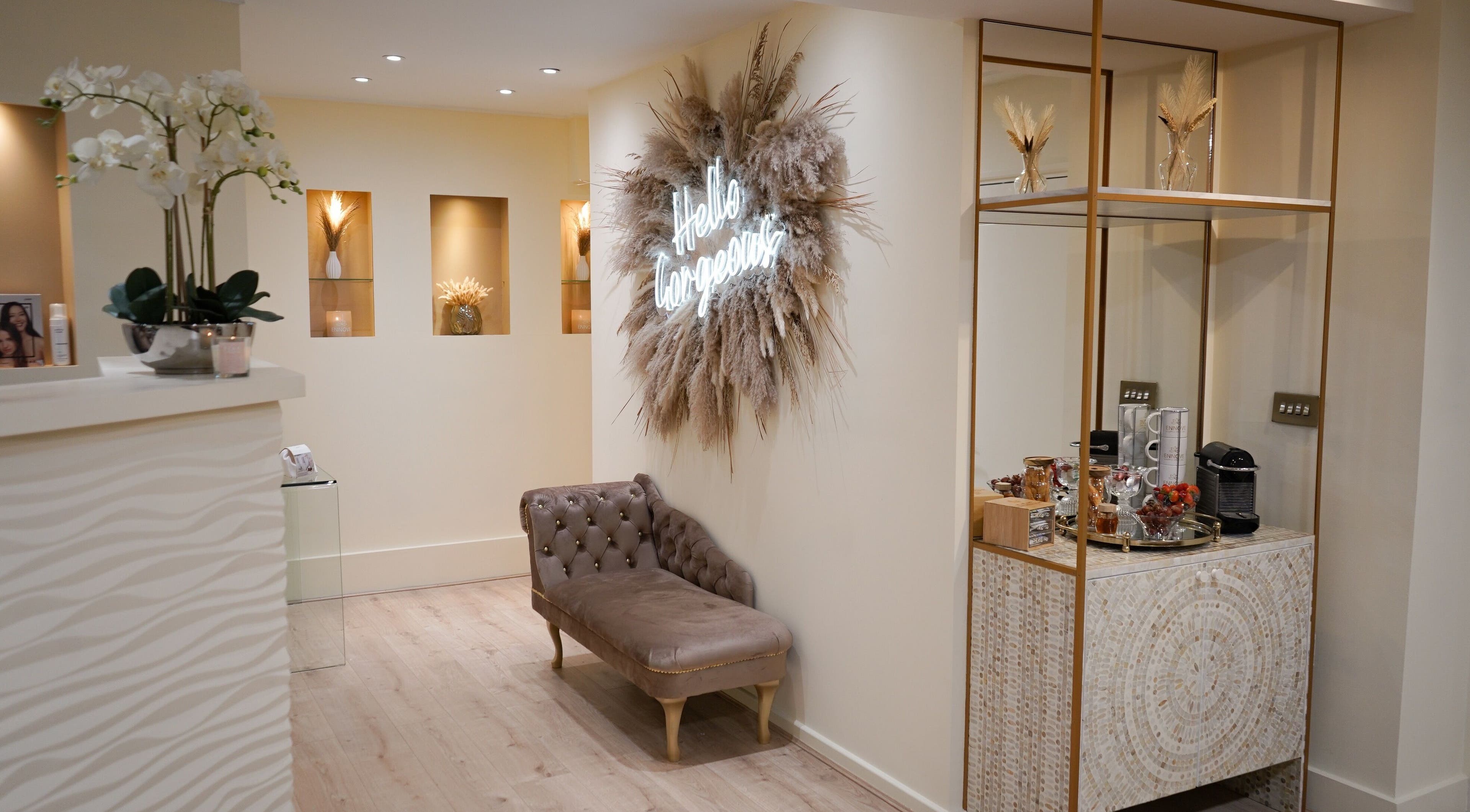 Stylish welcome area at Ennove Beauty & Detox Clinic, London, England, GB with elegant decor and seating.