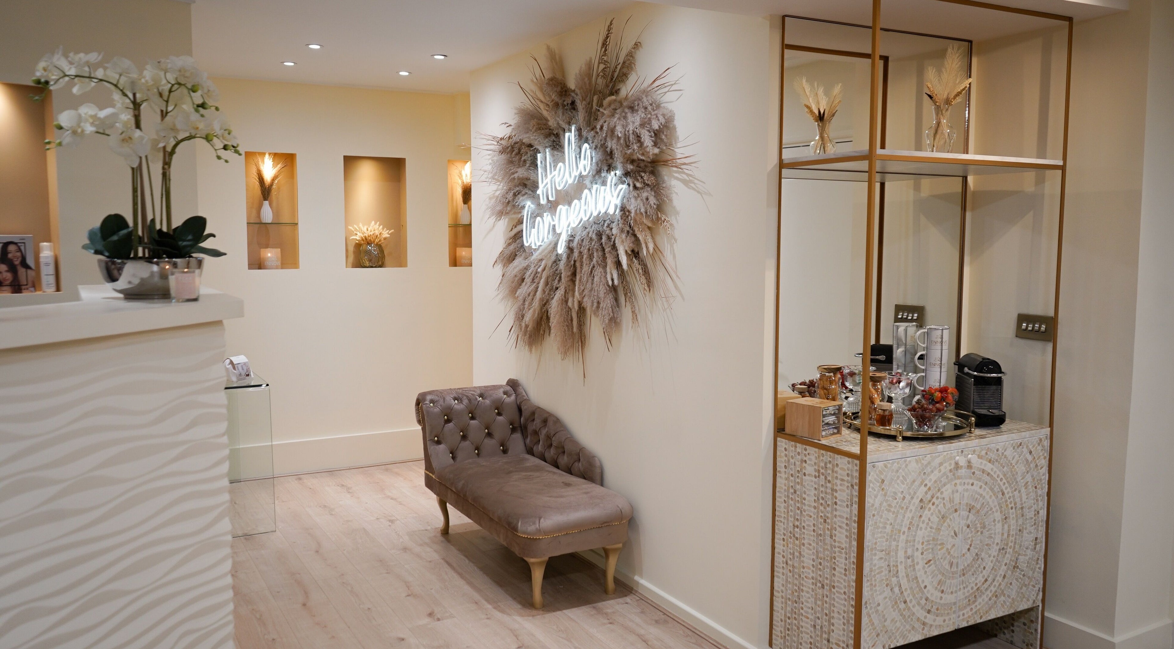 Stylish welcome area at Ennove Beauty & Detox Clinic, London, England, GB with elegant decor and seating.