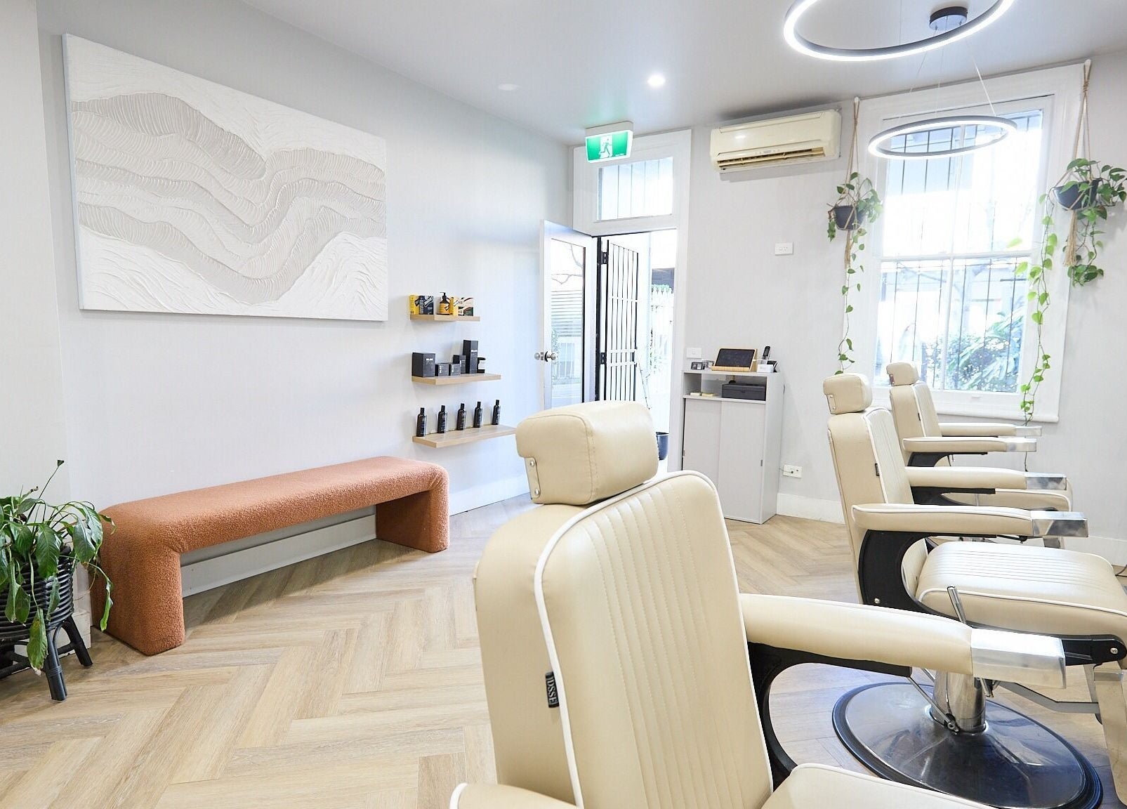 Modern interior of Verve Barbering - Surry Hills, featuring sleek chairs and minimalist decor, Surry Hills, New South Wales, AU.