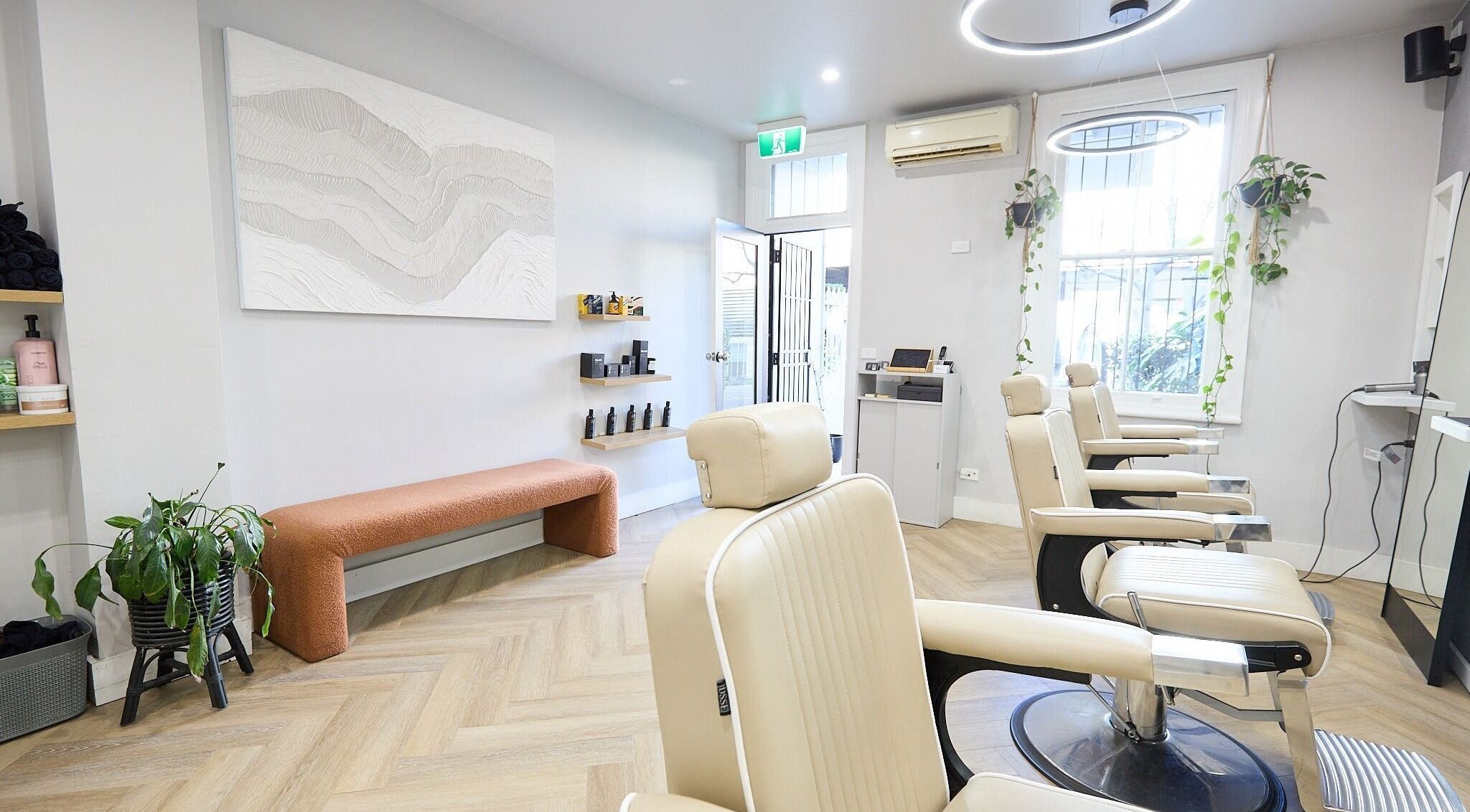 Modern interior of Verve Barbering - Surry Hills, featuring sleek chairs and minimalist decor, Surry Hills, New South Wales, AU.
