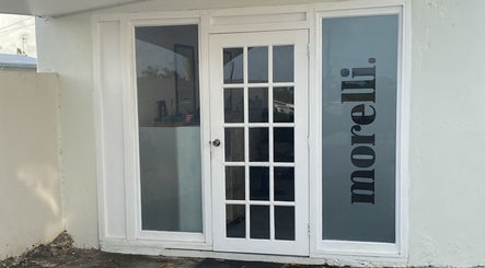 Chic entrance to morelli. beauty venue in Bridgetown, Saint Michael, BB with sophisticated glass doors.