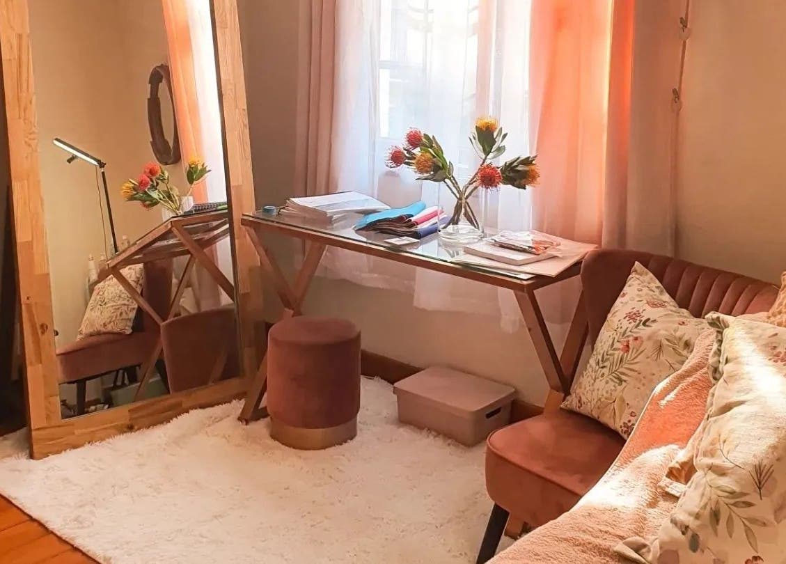 Elegant corner with mirror and plush sofa at Nika Beauty and Nail Studio, Lydenburg, Mpumalanga, ZA.