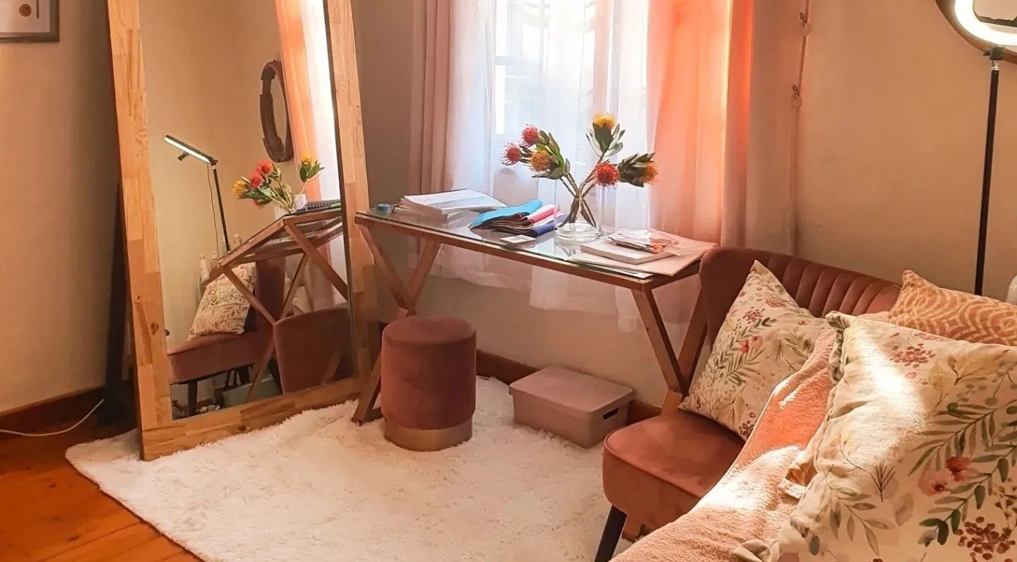 Elegant corner with mirror and plush sofa at Nika Beauty and Nail Studio, Lydenburg, Mpumalanga, ZA.