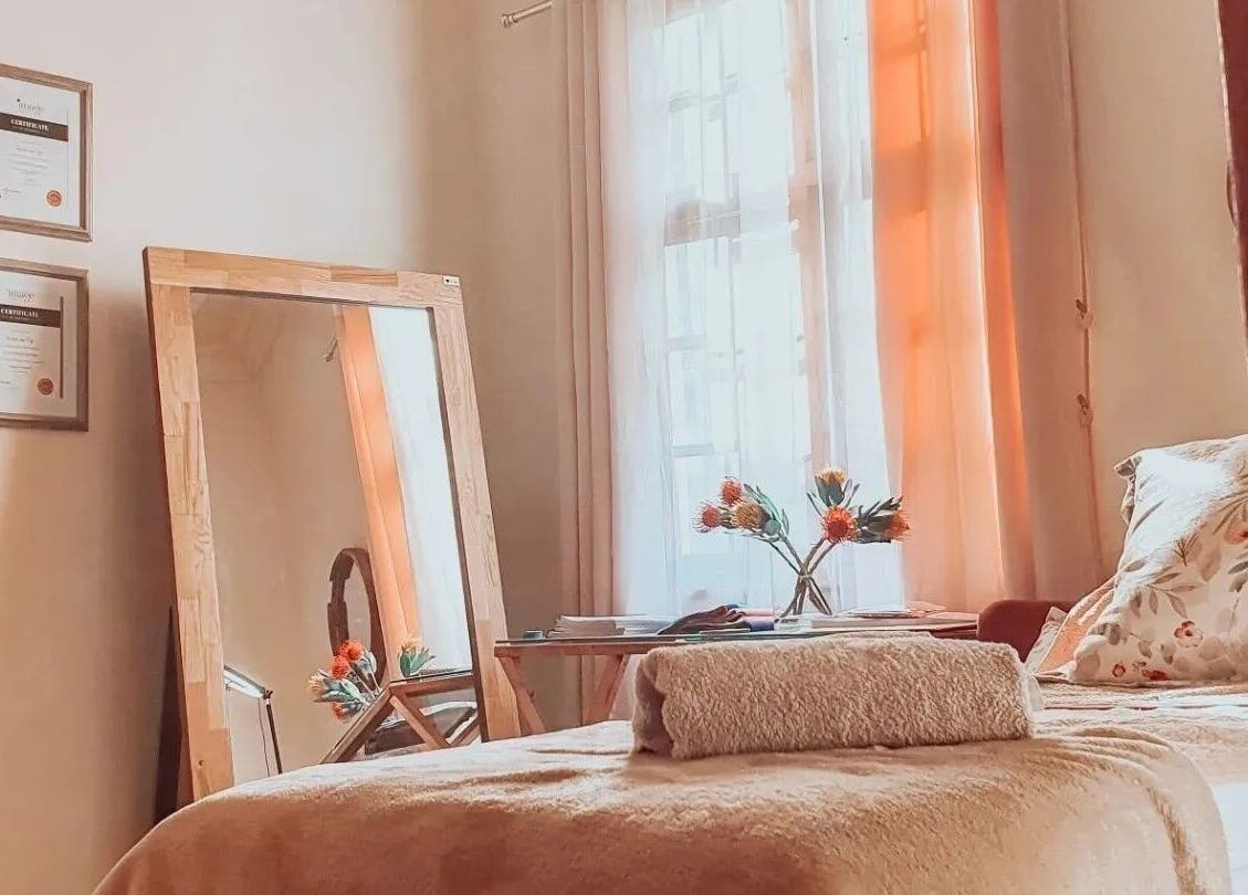 Relaxing room at Nika Beauty and Nail Studio, Lydenburg, Mpumalanga, ZA with floral decor and soft lighting.