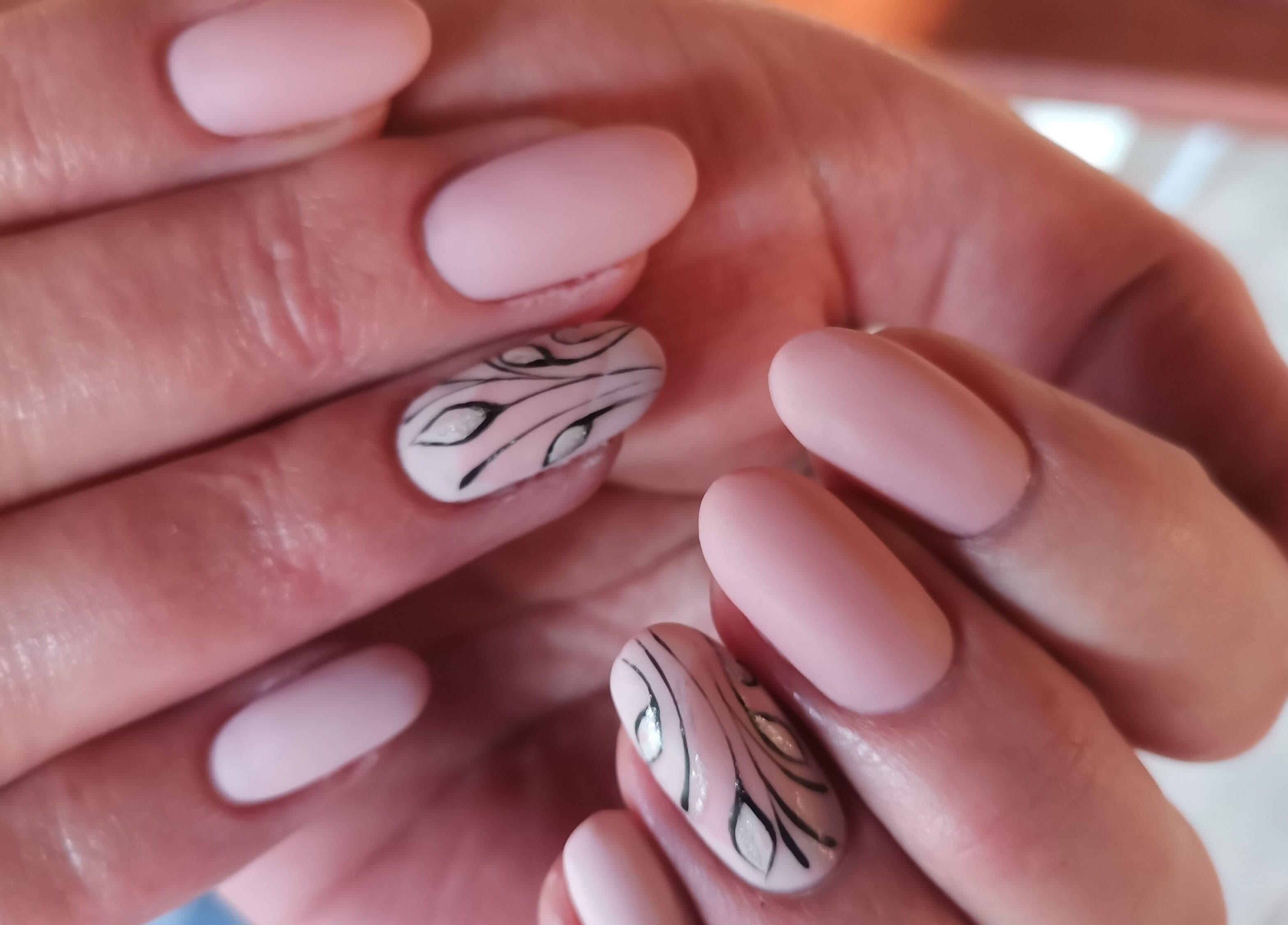 Elegant nail art at Nika Beauty and Nail Studio, Lydenburg, Mpumalanga, ZA, featuring pastel designs.