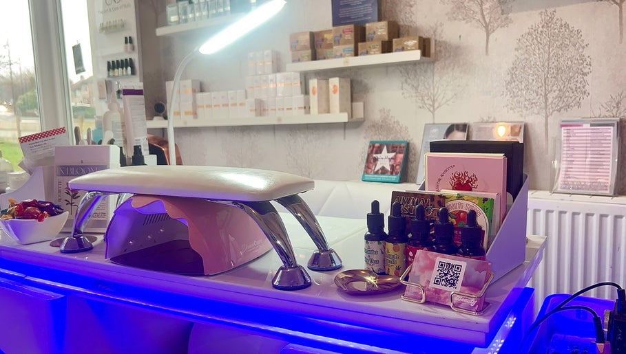 Modern nail station at MKM Beauty, Lancaster, England, GB, featuring manicure tools and products on display.