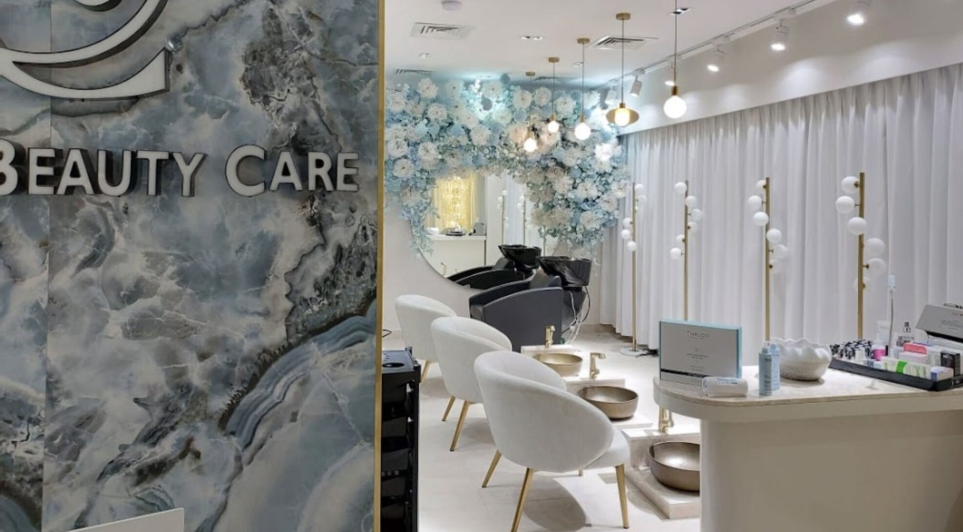 Luxurious interior of Golden Beauty Care Center in Sharjah, AE, featuring plush seating and modern decor.