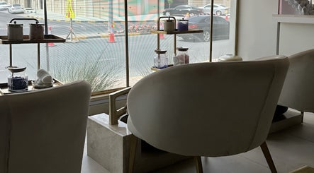 Relaxing seating at Golden Beauty Care Center, overlooking الشارقة, Sharjah, AE street view.