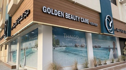 Golden Beauty Care Center facade in Sharjah, AE, showcasing modern design with inviting display.