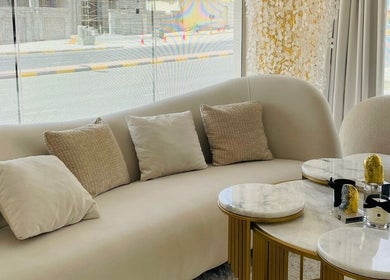 Modern lounge area at Golden Beauty Care Center, الشارقة, Sharjah, AE with stylish decor and cozy seating.