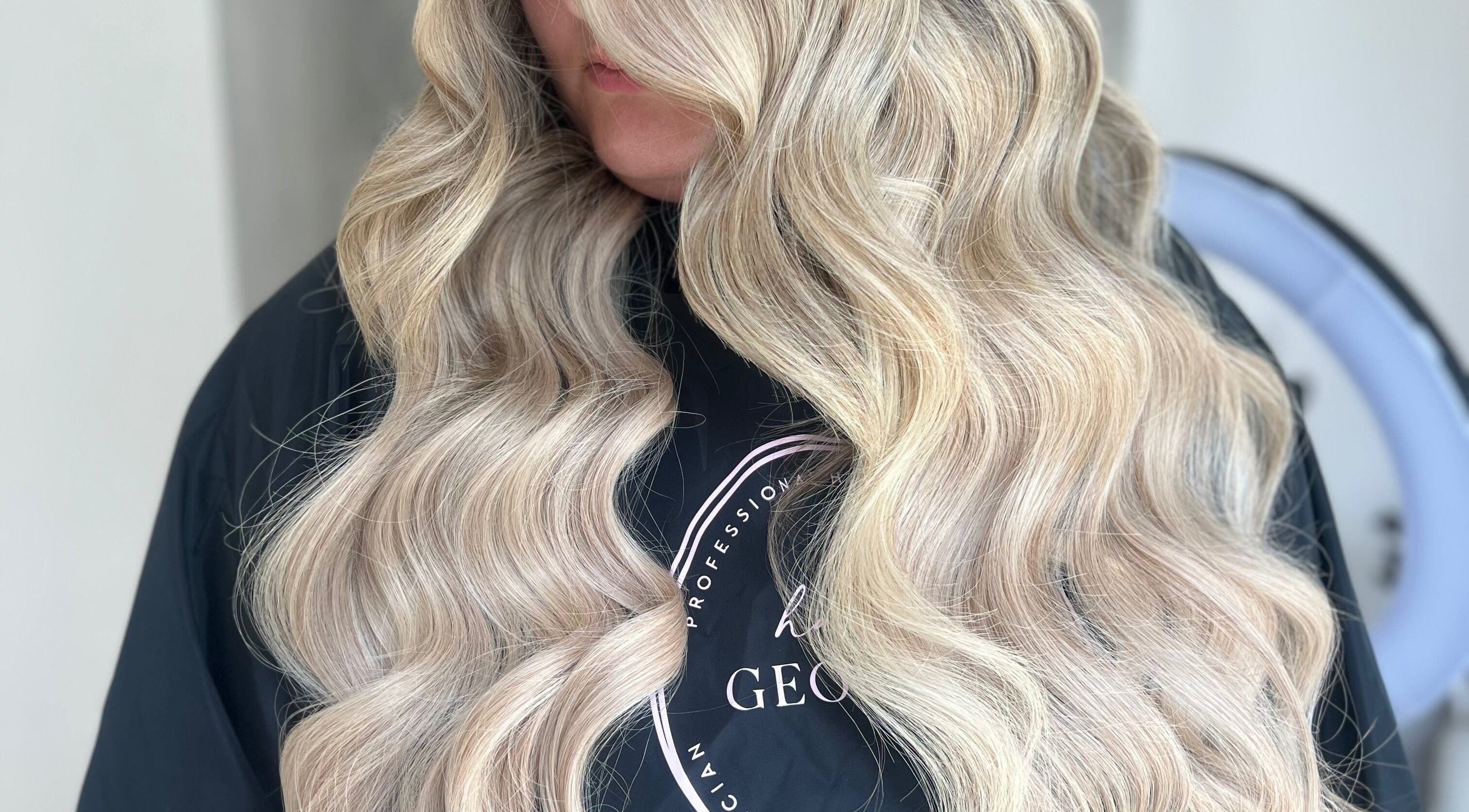 Blonde hair styled in soft waves at Hair by Georgina, Leeds, England, GB.