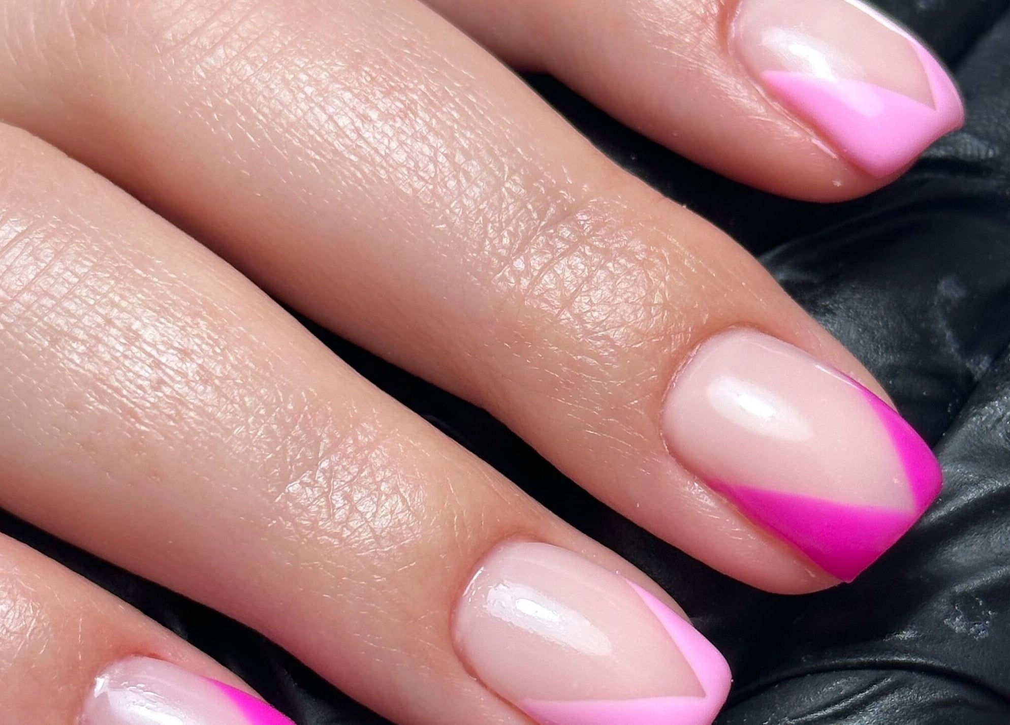 Pink nail art design at The Cure, Stockport, England, GB showcasing vibrant creativity and style.