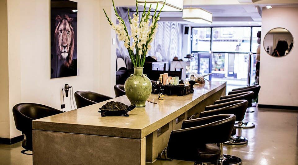 Chic interior of Bubblekid salon in Amsterdam, Noord-Holland, NL with modern decor and seating.