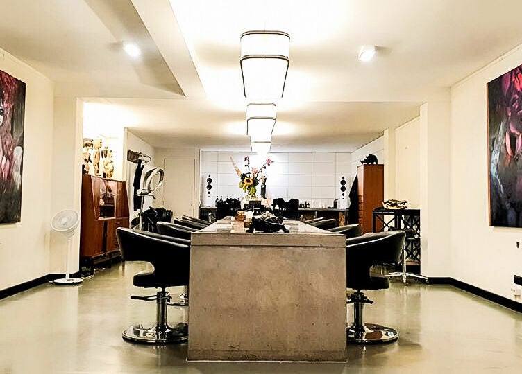 Chic and modern salon interior at Bubblekid, Amsterdam, Noord-Holland, NL with plush seating and contemporary decor.