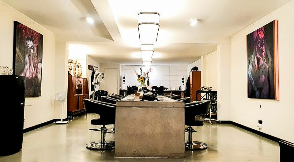 Chic and modern salon interior at Bubblekid, Amsterdam, Noord-Holland, NL with plush seating and contemporary decor.