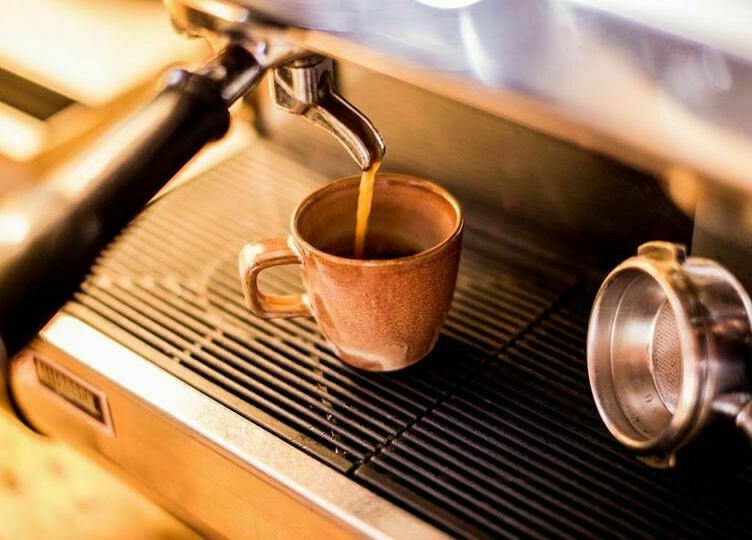 Fresh espresso being brewed at Bubblekid, Amsterdam, Noord-Holland, NL. Inviting and aromatic coffee experience.