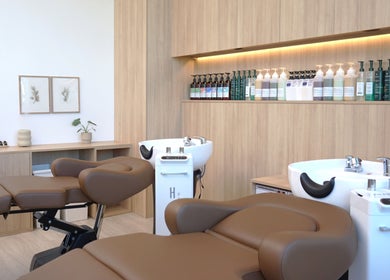 Relaxing wash stations at Forme Hair Salon & Head Spa in Vancouver, British Columbia, CA, showcasing luxury.