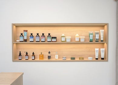 Product display at Forme Hair Salon & Head Spa, Vancouver, British Columbia, CA, showcasing beauty essentials.