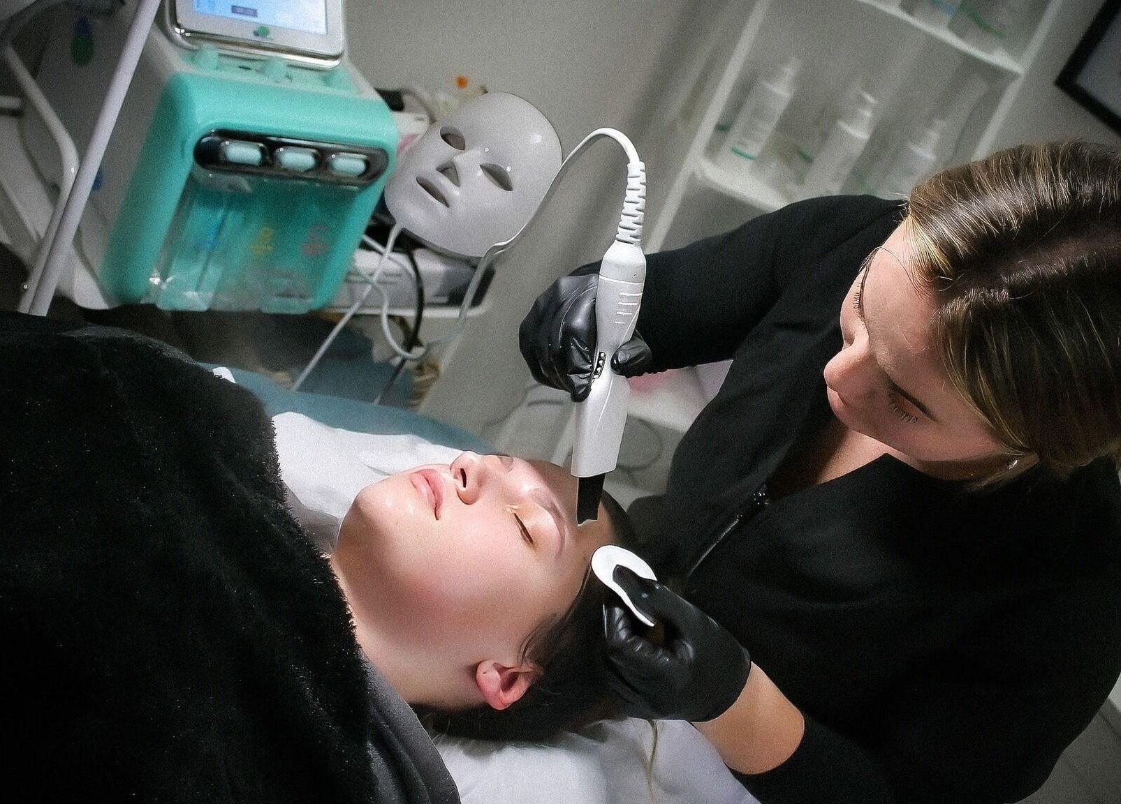Professional facial treatment at Naked Glow Clinic, Hartland, England, GB, enhancing skin health and radiance.