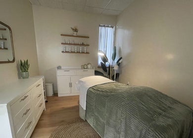 Cozy treatment room at Vitality Spa and Lounge, Bloomsburg, Pennsylvania, US, for ultimate relaxation.