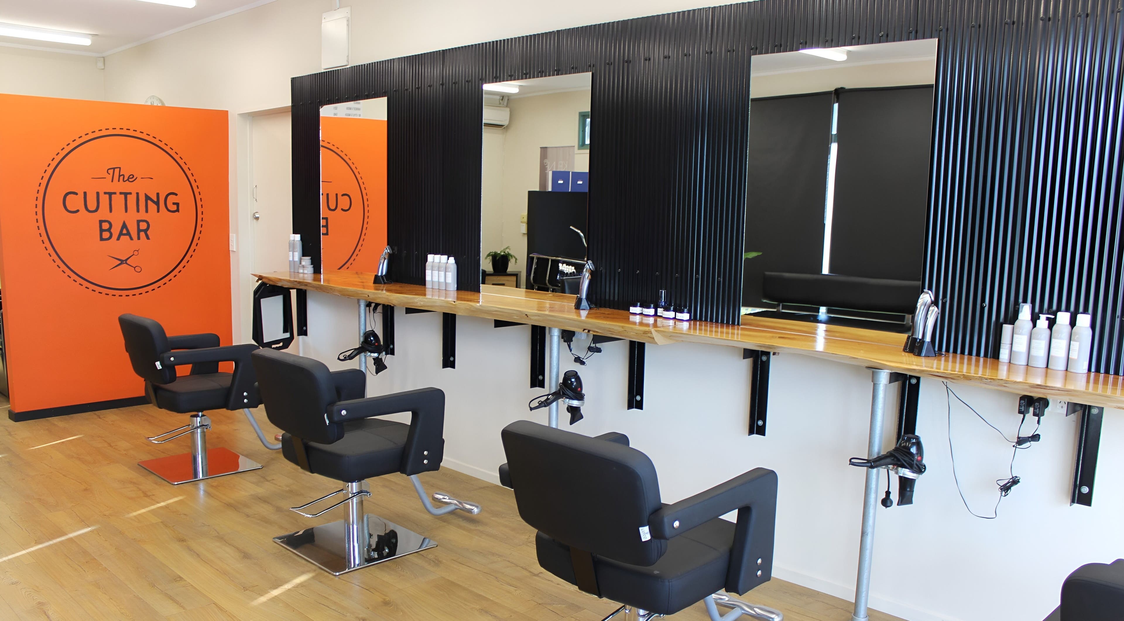 Modern salon chairs and mirrors at The Cutting Bar, Nelson, Nelson, NZ.