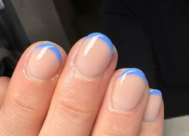 Close-up of chic blue French manicure at Chapel Beauty By Lucia, Harrogate, England, GB.